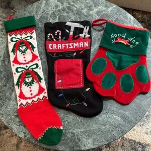Three Christmas Stockings 
Craftsman with pocket 
Good Dog 
Knit Snowman